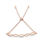 14K Rose Gold Plated .925 Sterling Silver 1/10 cttw Diamond Infinity Twist 4â€-10â€ Adjustable Bolo Bracelet (I-J Color, I2-I3 Clarity)