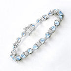 11.10 Carat Genuine Blue Topaz and White Diamond .925 Sterling Silver Bracelet