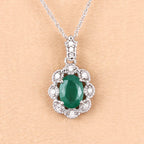 0.79 Carat Genuine Zambian Emerald and White Diamond 10K White Gold Pendant